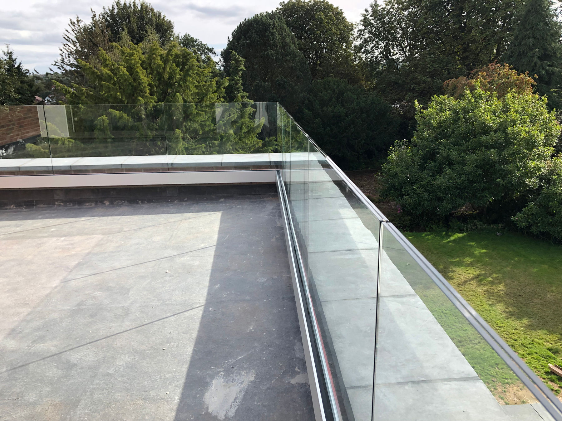 Frameless glass balustrade on rooftop terrace